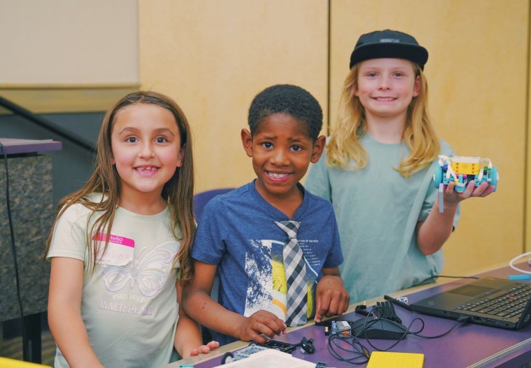 Campers Showing Off LEGO Robot