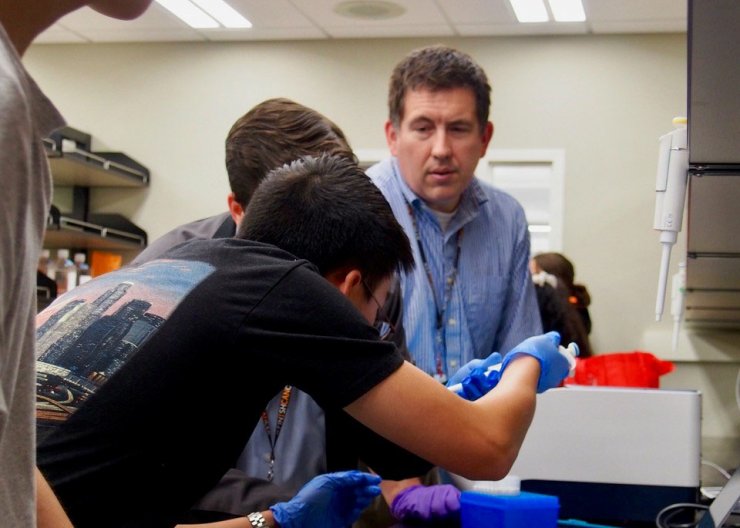 Saturday Academy students learning about cancer research with instructor Dr. Piening Saturday Academy students learning about cancer research with instructor Dr. Piening