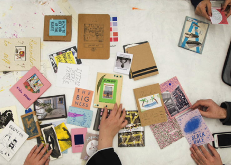 Teen Zines Students viewing zines in a Saturday Academy class