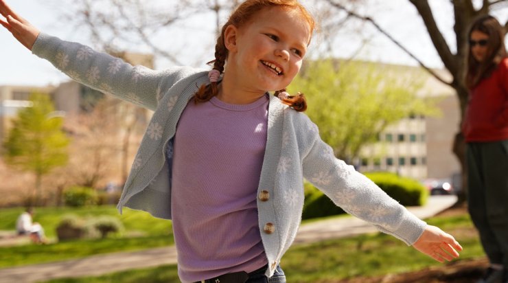 Girl outside during a Grades K-5 Days Off at OHSU