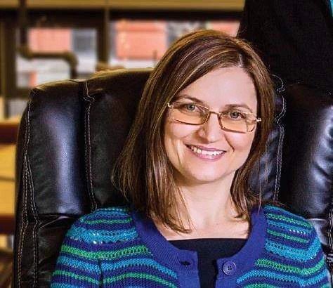 Seated smiling woman