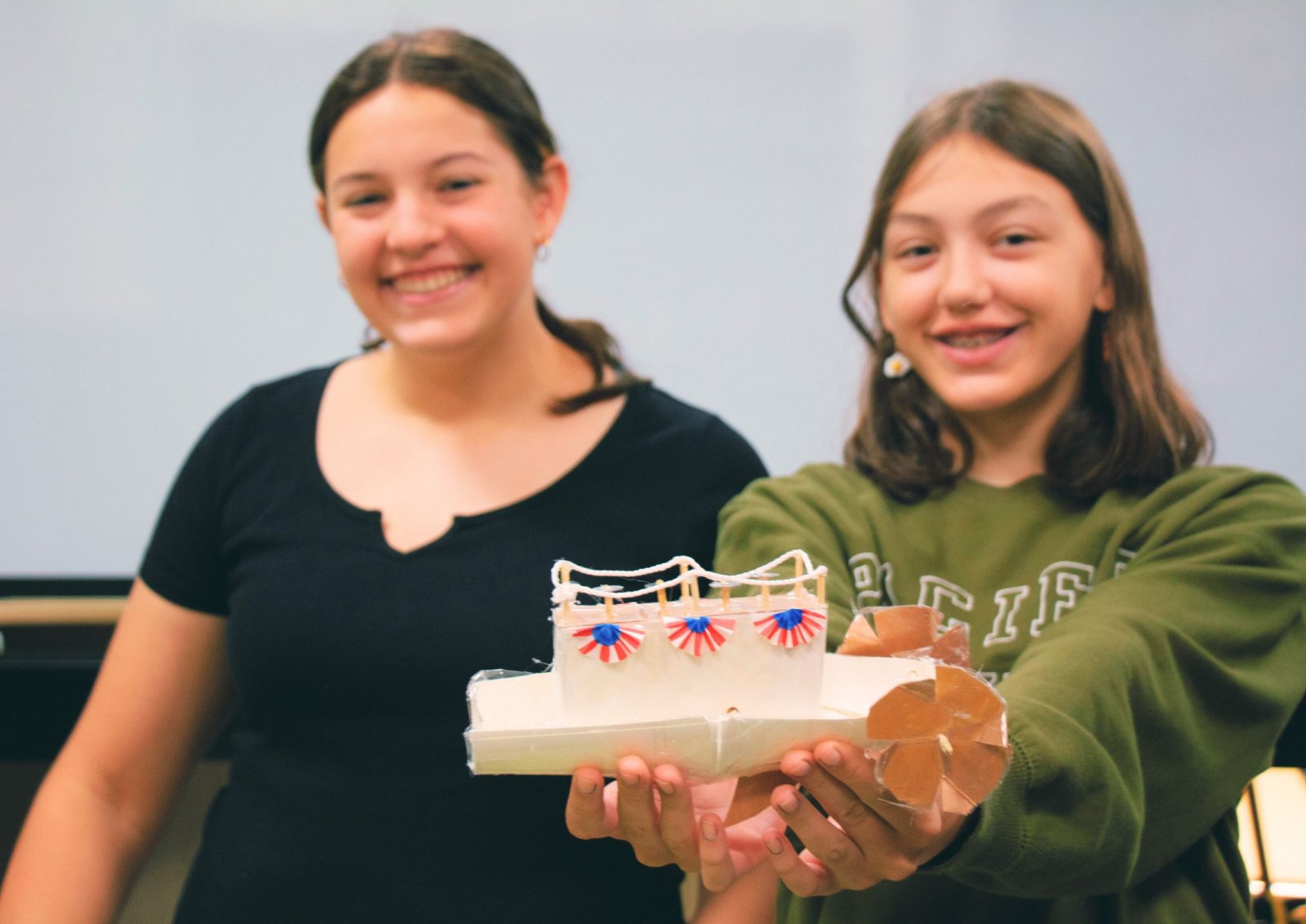 Campers showing off engineering project