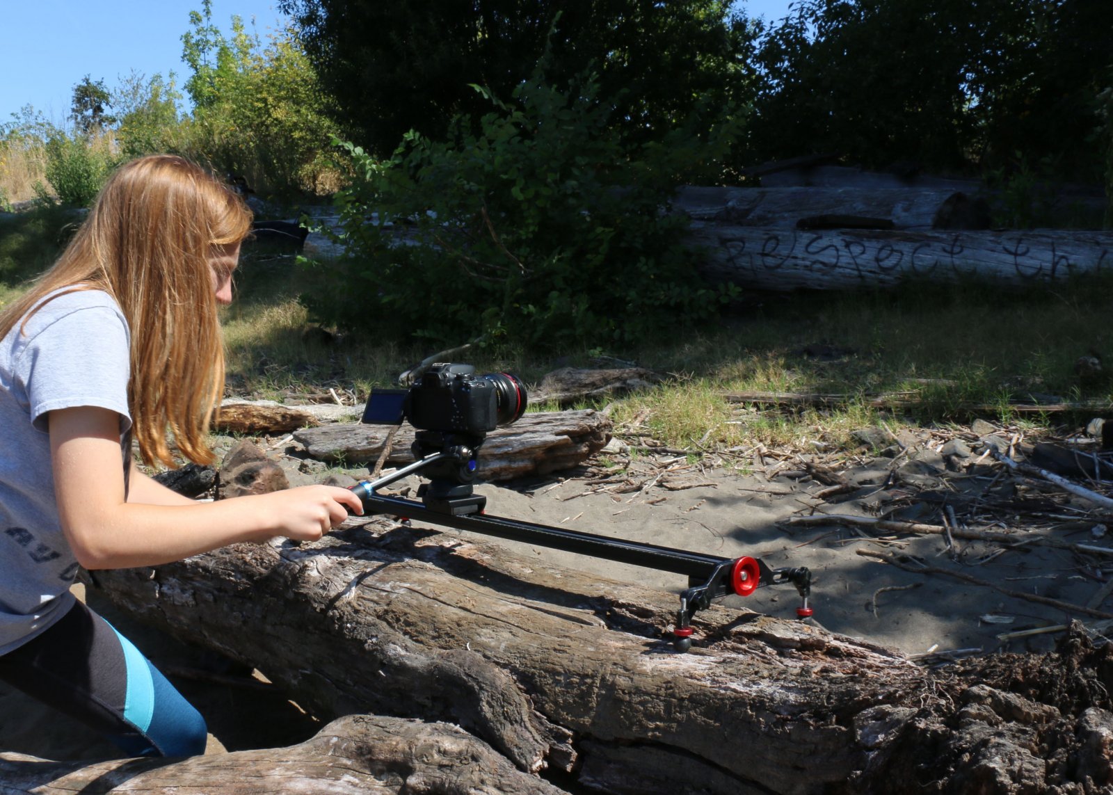 Girl making a movie outside